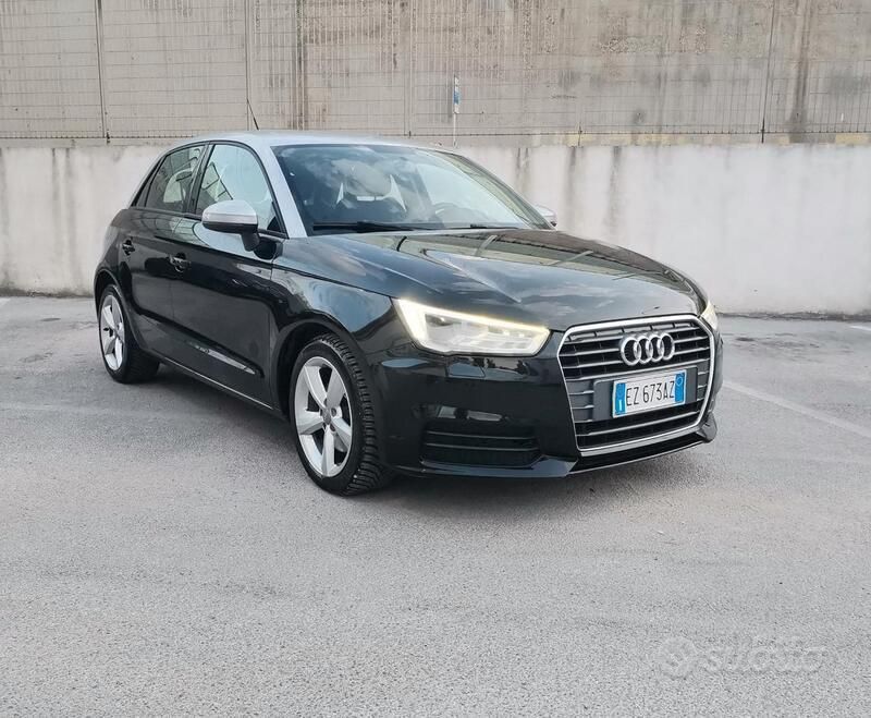 Nero Usata 2015 Audi A1 Sportback Ambition Due volumi | 9900 € (Buon prezzo) - Immagine 1/4