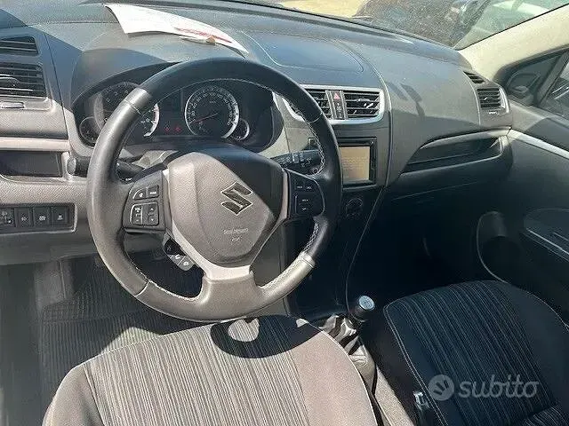 Second-hand Suzuki Swift 94 CP (69 kW) 2014 Alb Hatchback