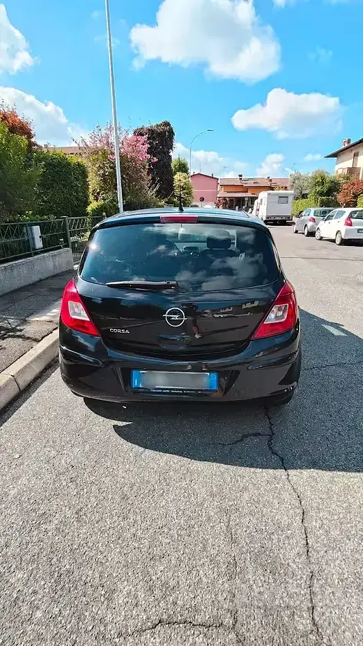 Usata Opel Corsa 95 CV (69 kW) 2010 Nero Utilitaria