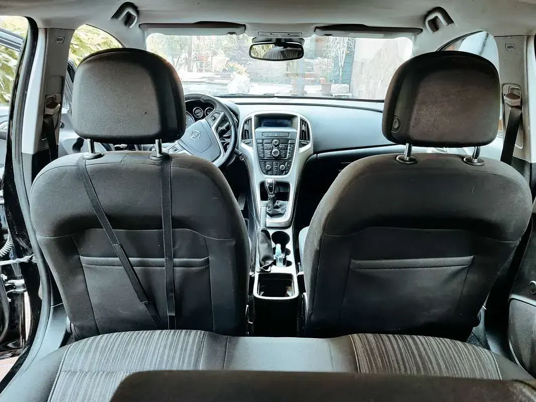 Usata Opel Astra 125 CV (91 kW) 2011 Nero Berlina