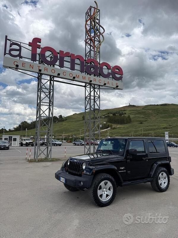 Nero Usata 2010 Jeep Wrangler Sahara SUV | 20.000 € (Buon prezzo) - Immagine 1/4