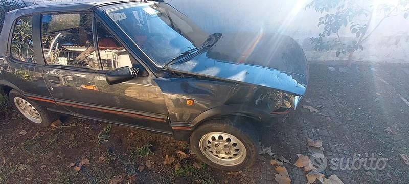 Usata Peugeot 205 113 CV (83 kW) 1990 Grigio Cabrio