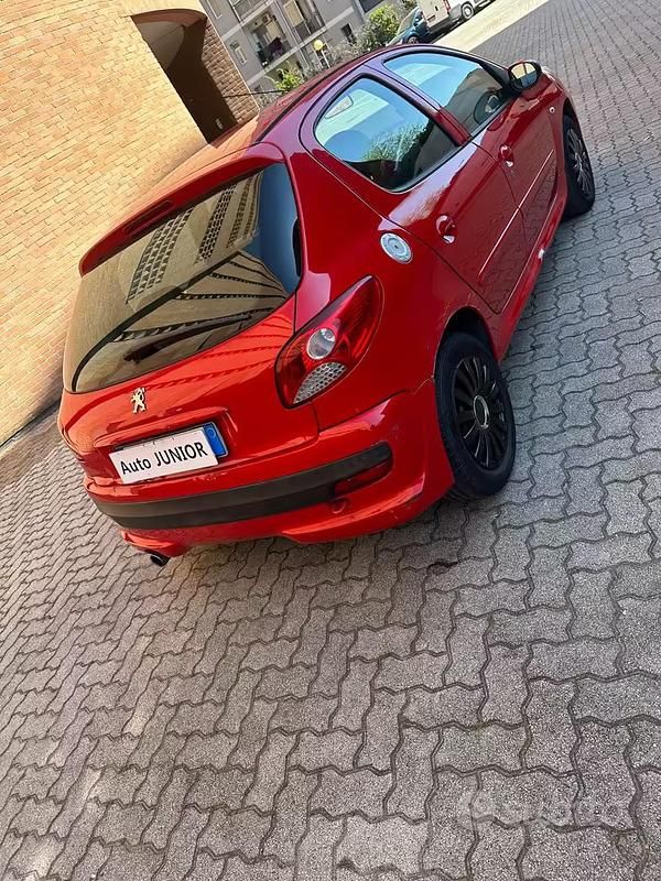 Usata Peugeot 206+ 70 CV (51 kW) 2012 Rosso Utilitaria
