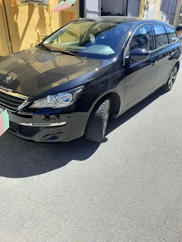 Begagnad Peugeot 308 SW Active 120 HK (88 kW) 2016 Svart Kombi