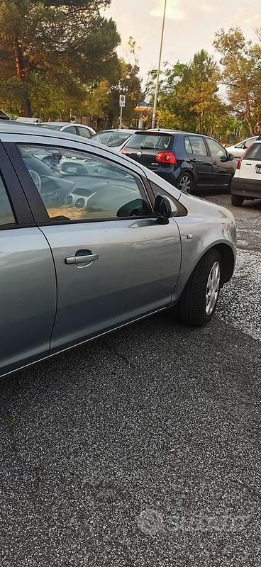 Usata Opel Corsa 54 CV (39 kW) 2012 Grigio Berlina
