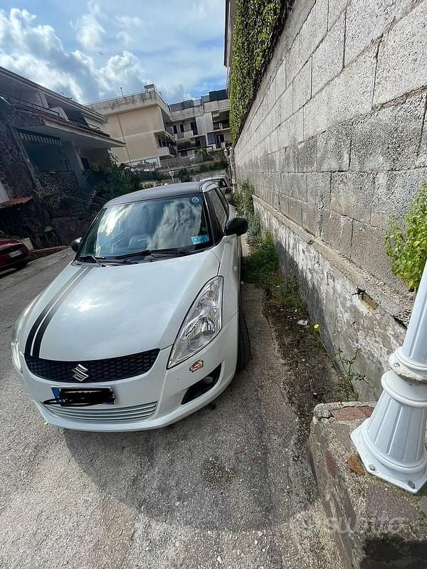 Usata Suzuki Swift 94 CV (69 kW) 2011 Bianco Utilitaria