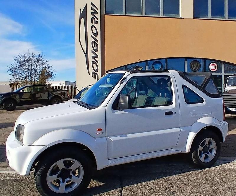 Vernice pastello Usata 2006 Suzuki Jimny SUV | 12.200 € (Cara) - Immagine 1/4
