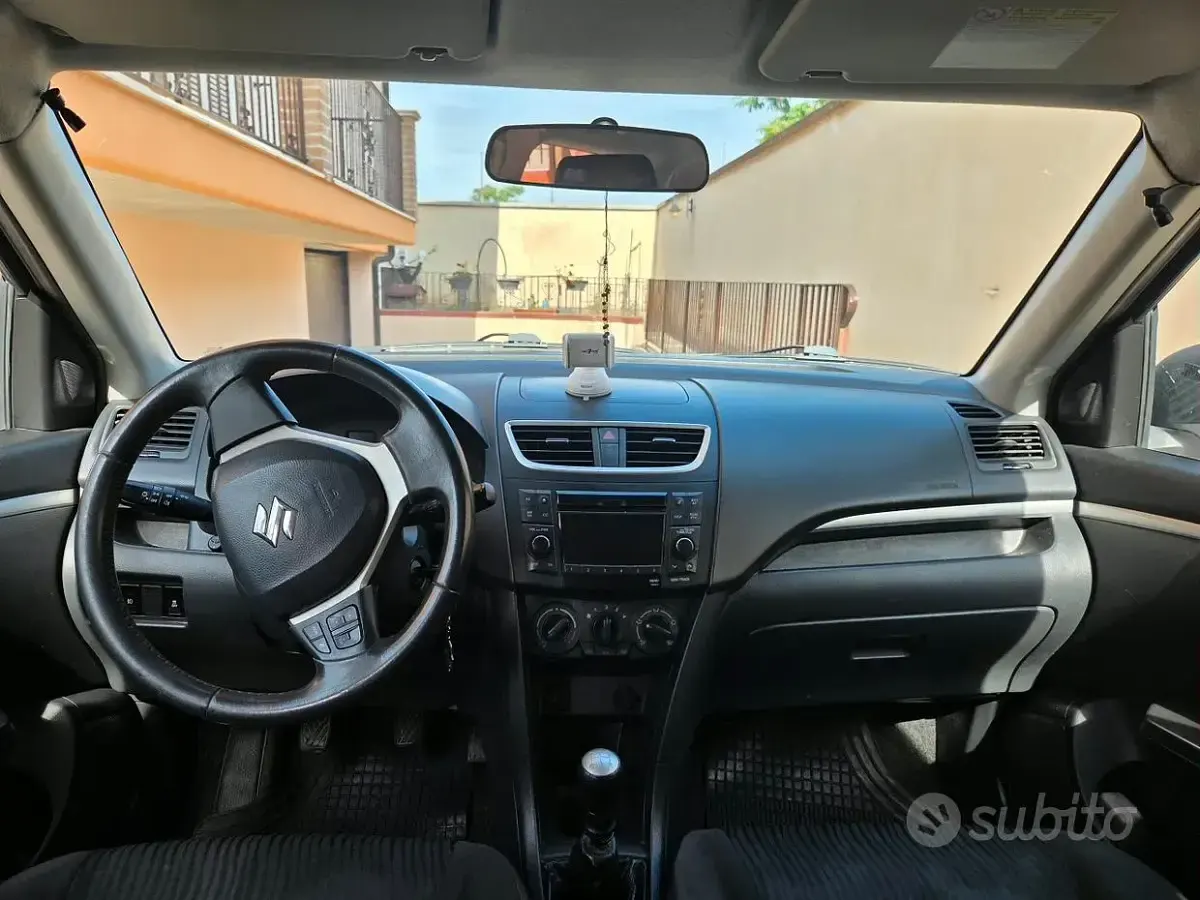 Usata Suzuki Swift 75 CV (55 kW) 2011 Bianco Utilitaria