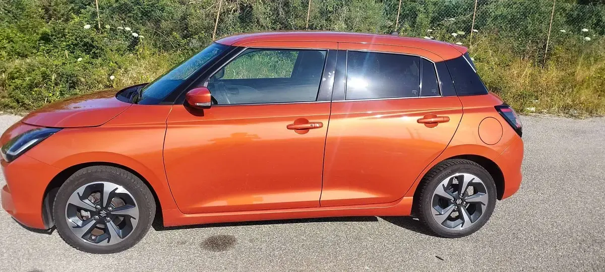 Usata Suzuki Swift 82 CV (60 kW) 2025 Arancione Utilitaria