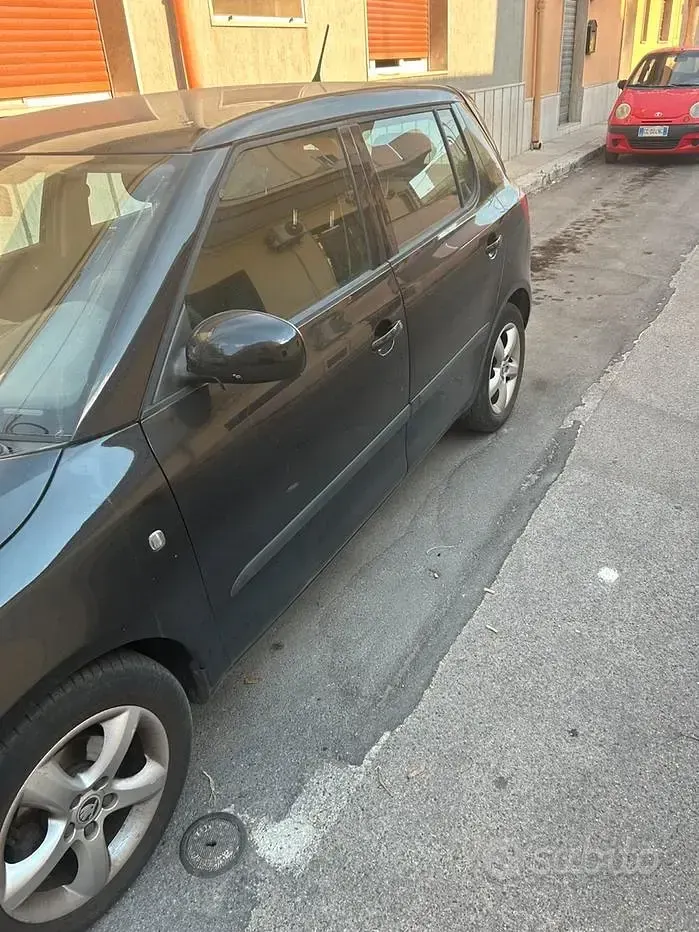 Usata Skoda Fabia GreenLine 75 CV (55 kW) 2013 Nero Berlina