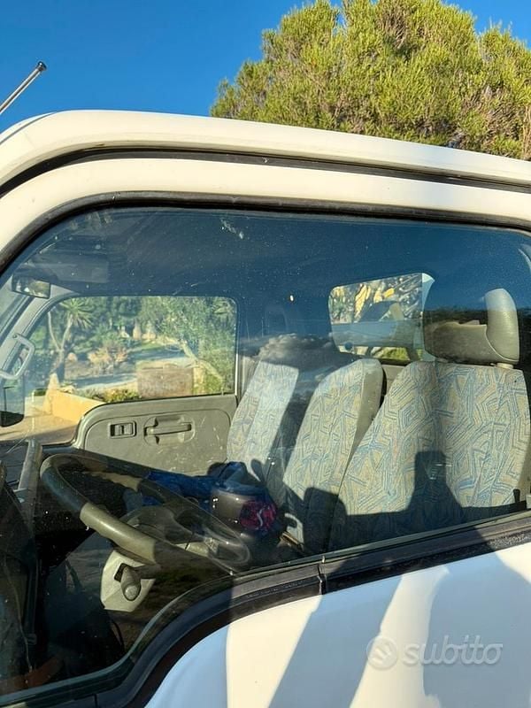 Usata Nissan Cabstar 106 CV (77 kW) 2000 Bianco Pick-up