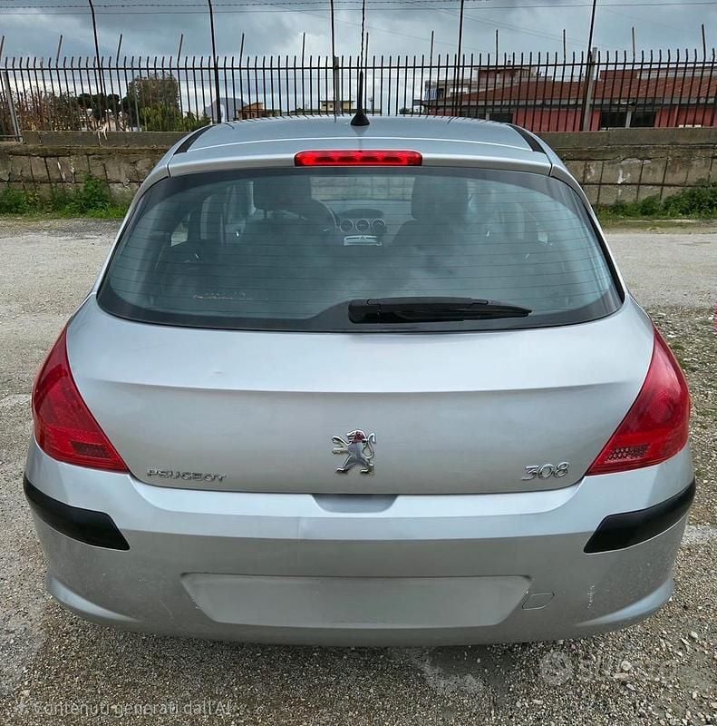 Usata Peugeot 308 Premium 98 CV (72 kW) 2011 Grigio Berlina