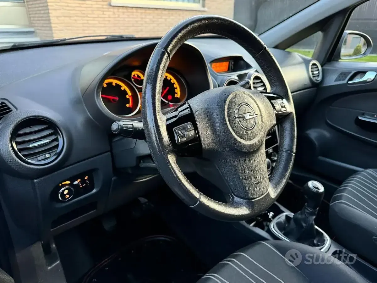 Usata Opel Corsa 95 CV (69 kW) 2010 Grigio Utilitaria