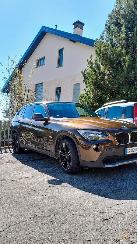 Marrone Usata 2011 BMW X1 SUV | 8950 € (Cara) - Immagine 1/4