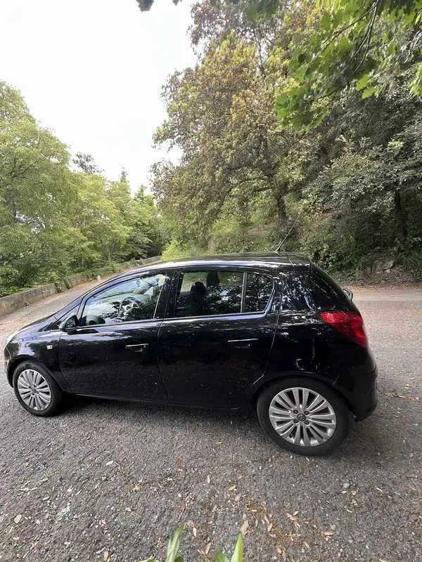 Usata Opel Corsa Cosmo 95 CV (69 kW) 2011 Nero Utilitaria