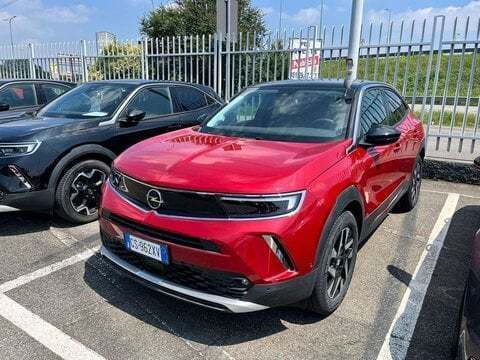 Rosso Nuova 2024 Opel Mokka Elegance SUV | 18.990 € - Immagine 1/4
