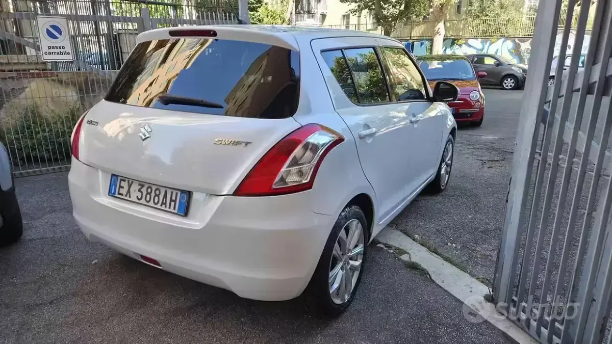 Usata Suzuki Swift 94 CV (69 kW) 2014 Bianco Utilitaria