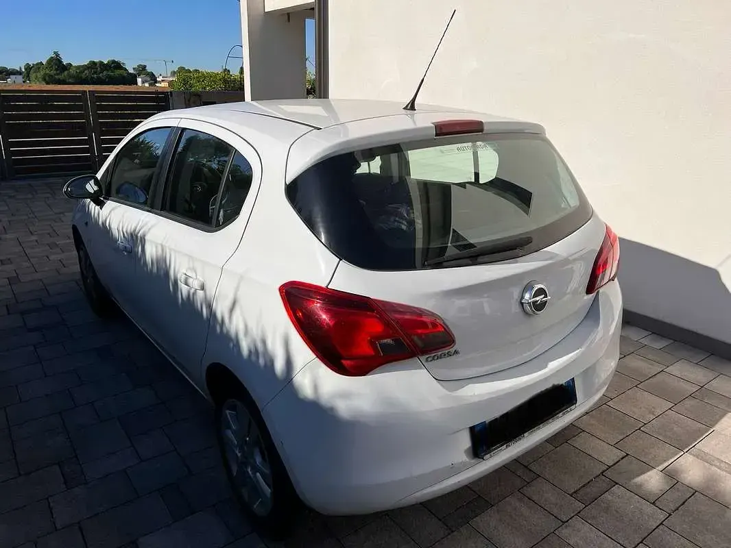 Używany Opel Corsa 90 KM (66 kW) 2015 Biały Hatchback