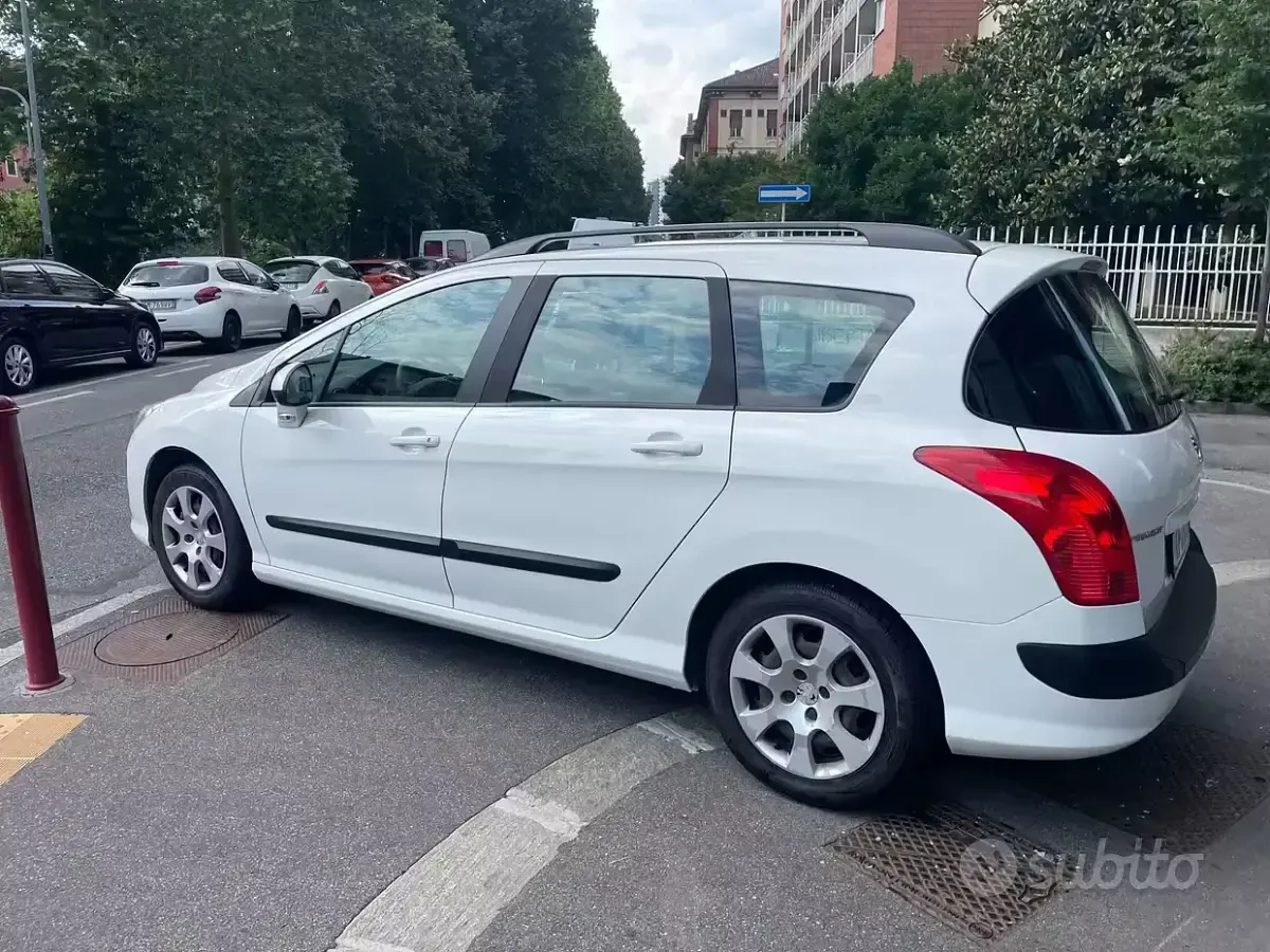 Usata Peugeot 308 SW 112 CV (82 kW) 2013 Bianco Station wagon