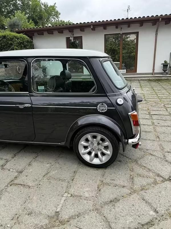 Usata Mini 1300 Sport 63 CV (46 kW) 1997 Nero Utilitaria