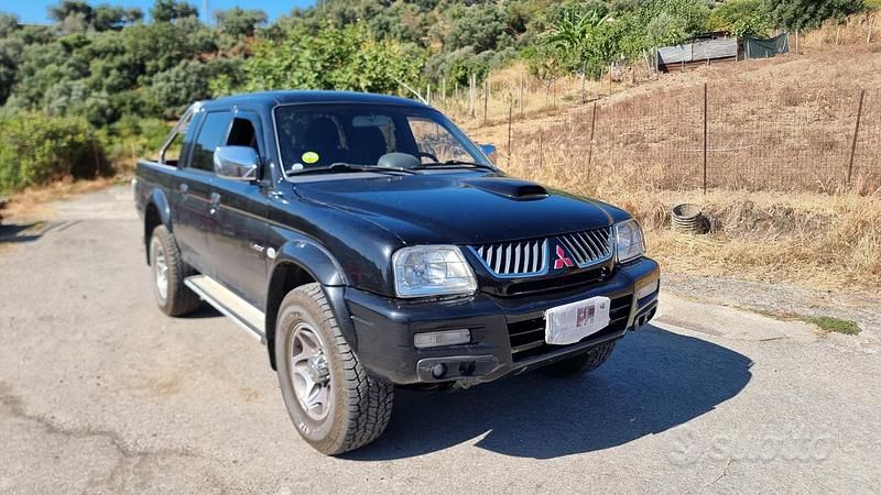 Nero Usata 2003 Mitsubishi L200 Pick-up | 12.000 € (Cara) - Immagine 1/4