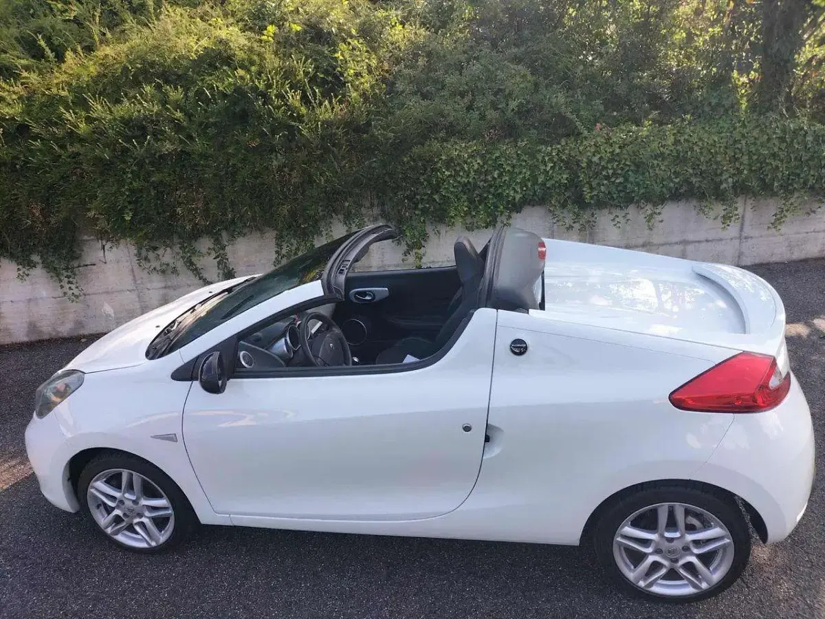 Usata Renault Wind 101 CV (74 kW) 2011 Bianco pastello Cabrio