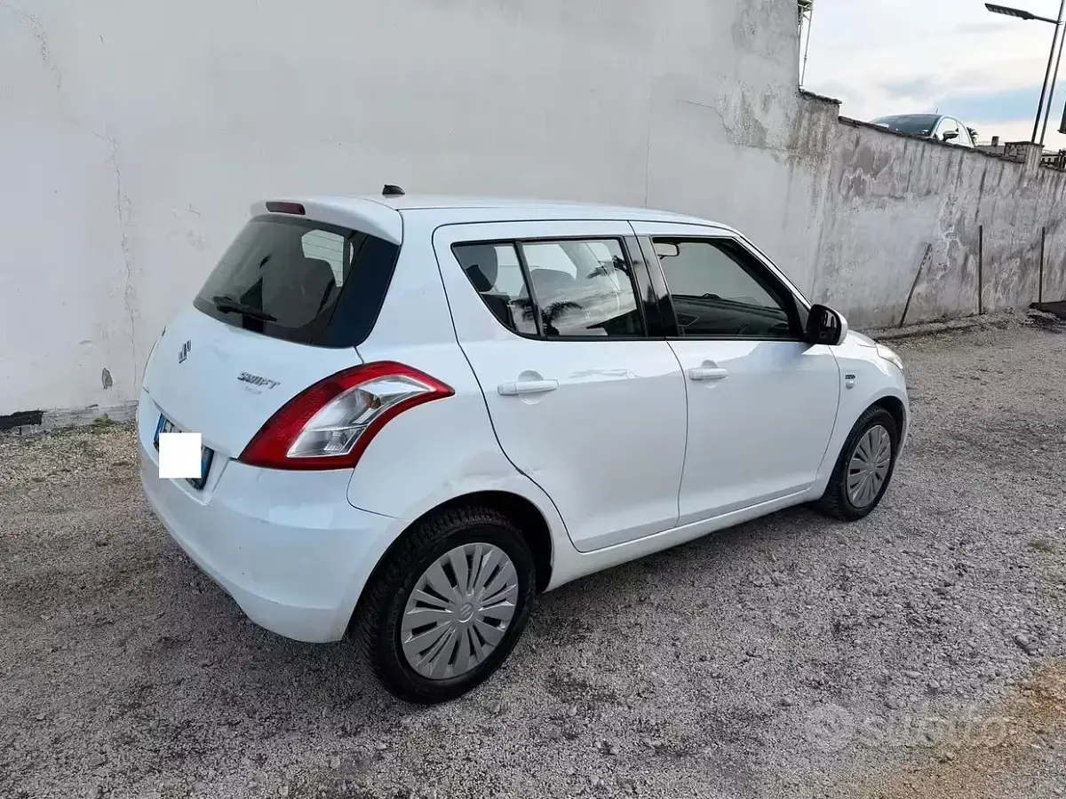 Usata Suzuki Swift 75 CV (55 kW) 2014 Bianco Utilitaria