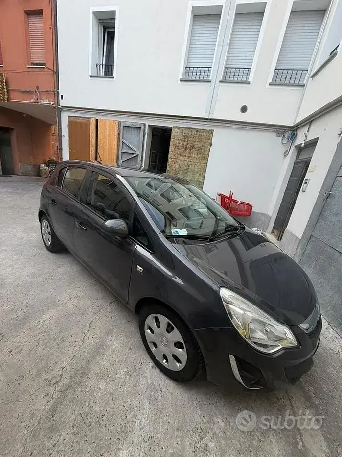 Usata Opel Corsa 54 CV (39 kW) 2013 Grigio Utilitaria