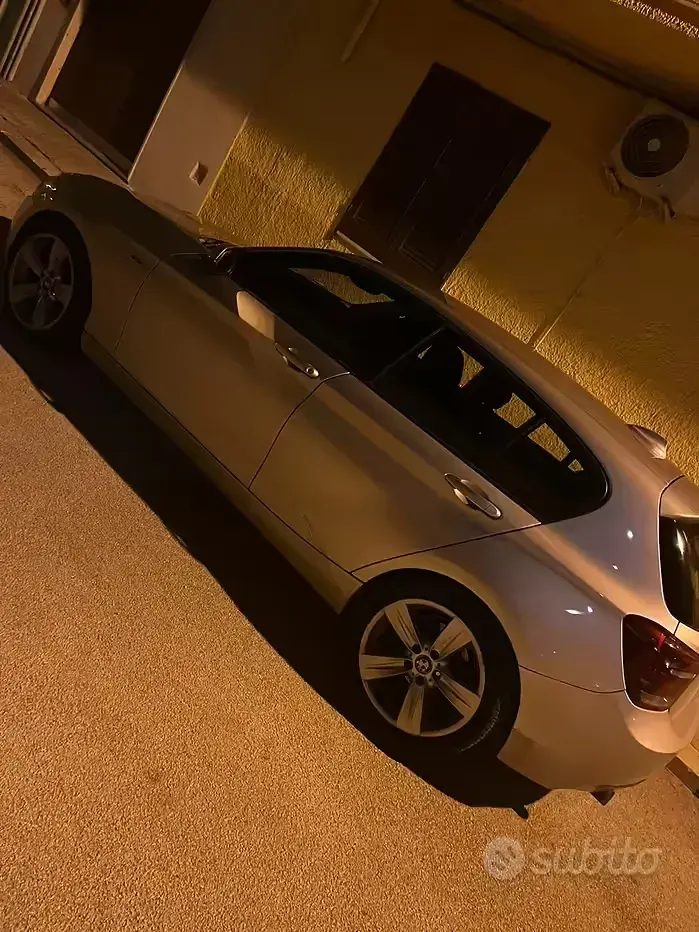 Usata BMW 118 143 CV (105 kW) 2012 Grigio Utilitaria