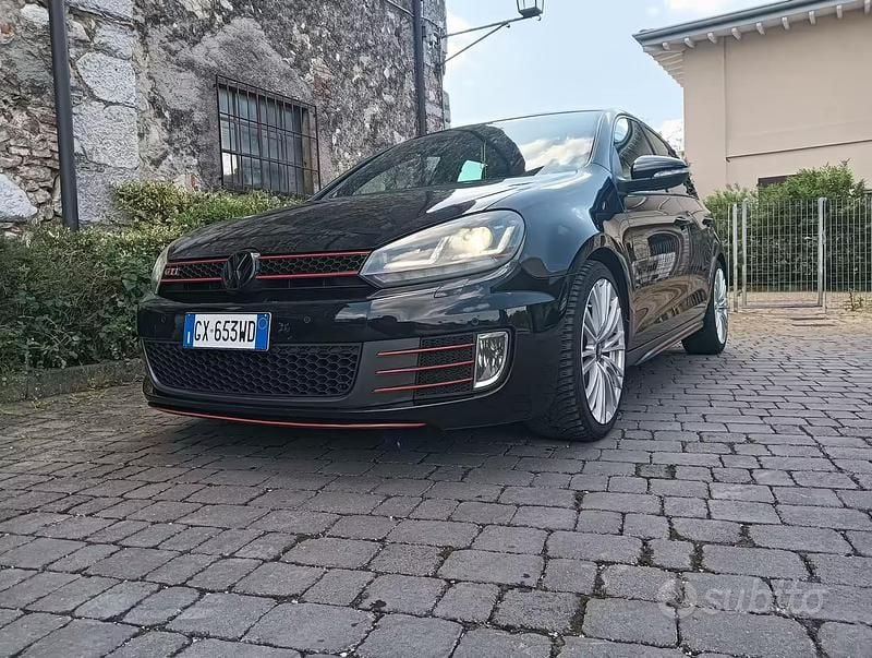 Second-hand VW Golf VII GTI 210 CP (154 kW) 2012 Negru Berlinǎ