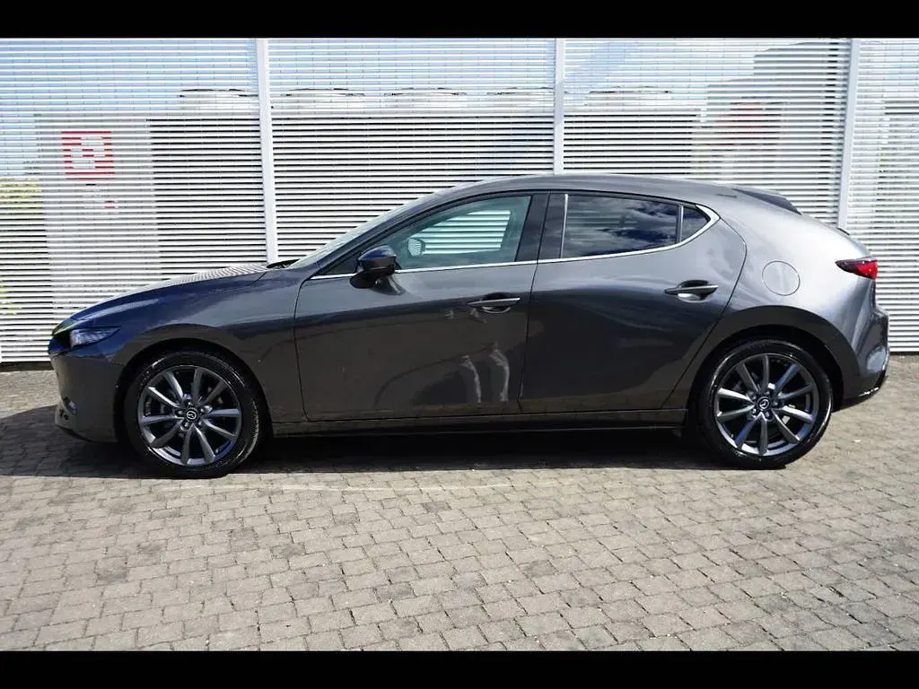 Nuova Mazda 3 140 CV (102 kW) 2026 Machine grey Berlina