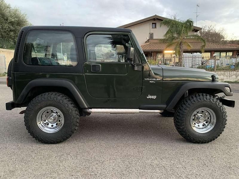 Occasion Jeep Wrangler Sport 177 ch (130 kW) 1998 Vert SUV