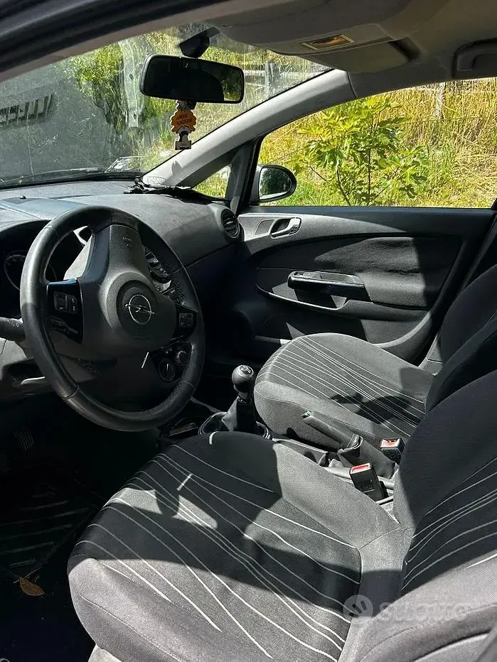 Usata Opel Corsa 85 CV (62 kW) 2010 Grigio Utilitaria