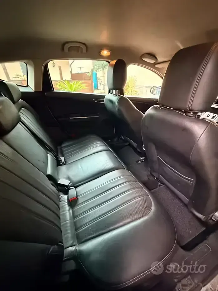 Usata Lancia Delta 90 CV (66 kW) 2013 Verde Utilitaria