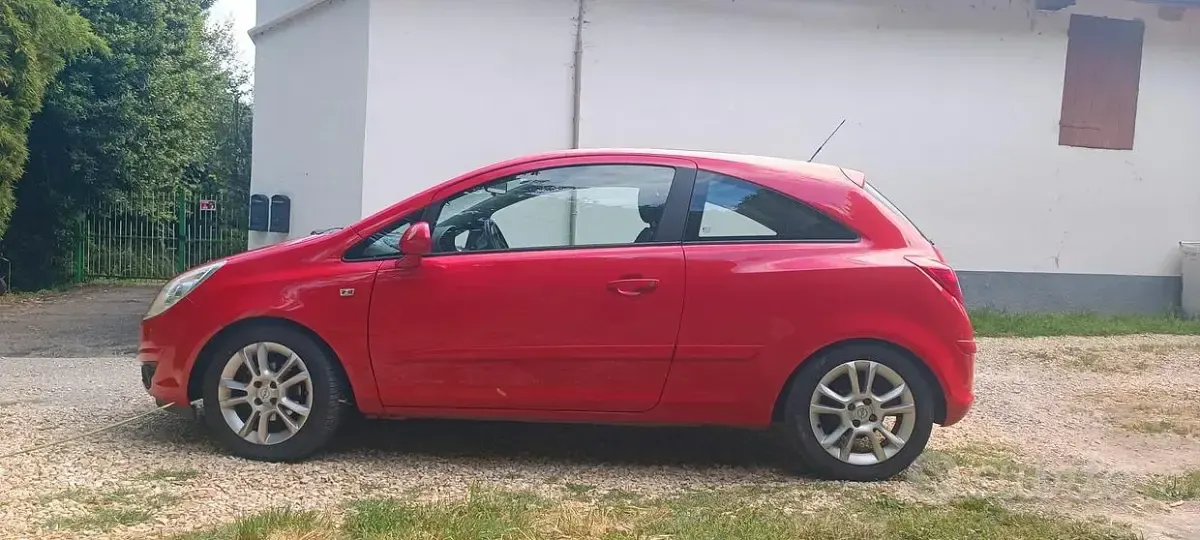 Usata Opel Corsa 80 CV (58 kW) 2007 Rosso Utilitaria