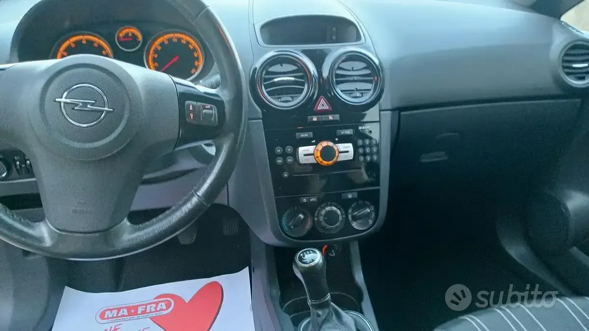 Usata Opel Corsa 75 CV (55 kW) 2010 Grigio Utilitaria