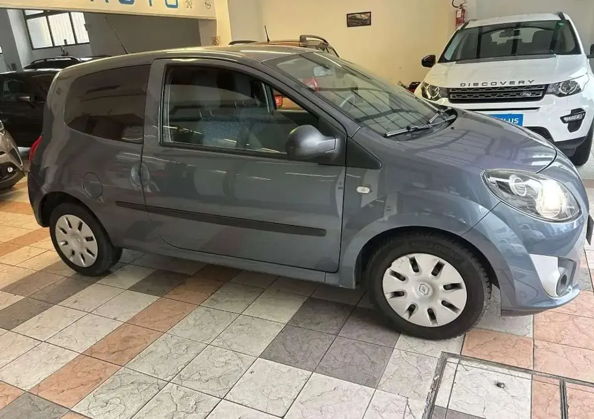 Usado Renault Twingo LE 58 HP (42 kW) 2009 Cinzento Citadino