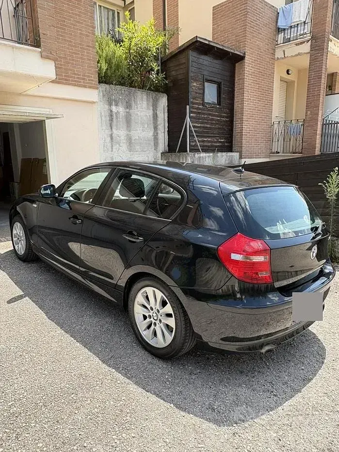 Usata BMW 116 116 CV (85 kW) 2009 Nero Utilitaria