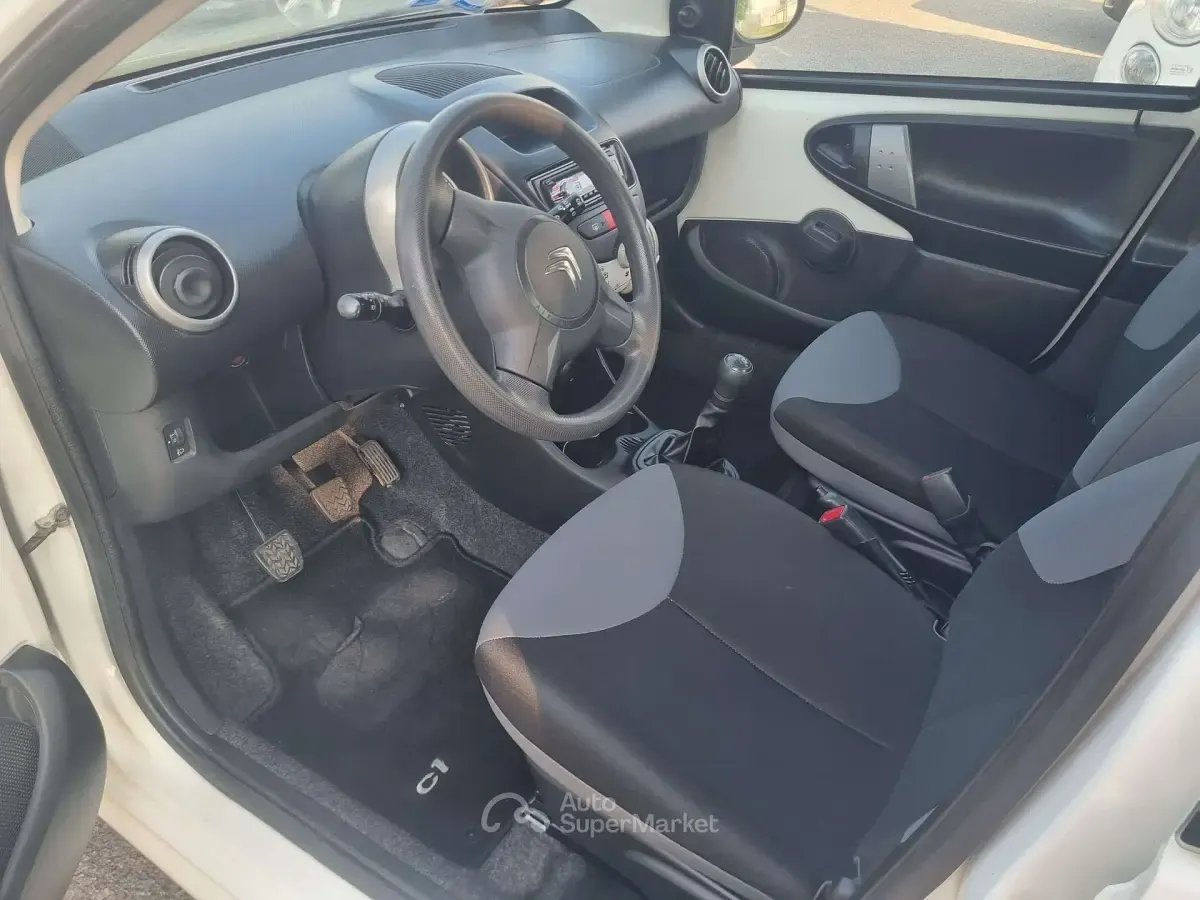 Usado Citroën C1 Attraction 68 CV (50 kW) 2012 Blanco Utilitario