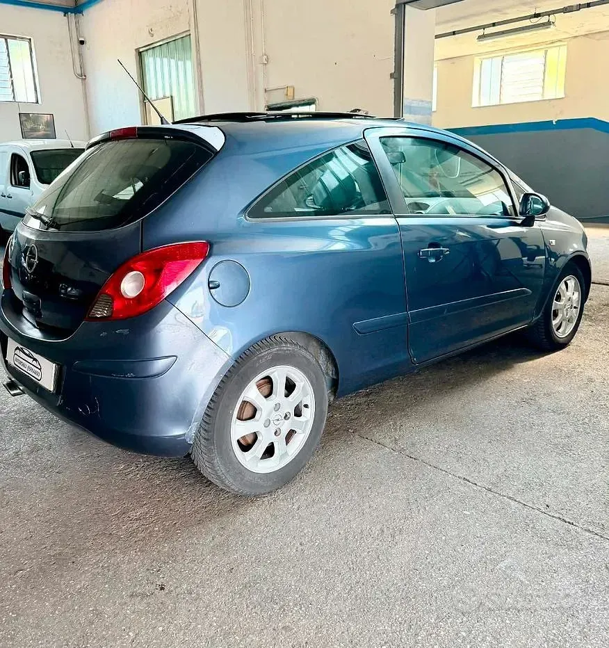 Usata Opel Corsa 69 CV (50 kW) 2009 Grigio Utilitaria