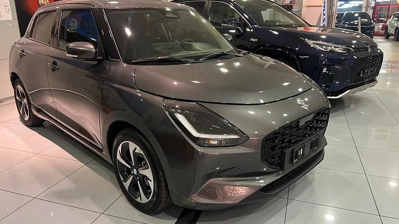 Arancione Nuova 2025 Suzuki Swift Due volumi | 17.990 € (Ottimo prezzo) - Immagine 1/4