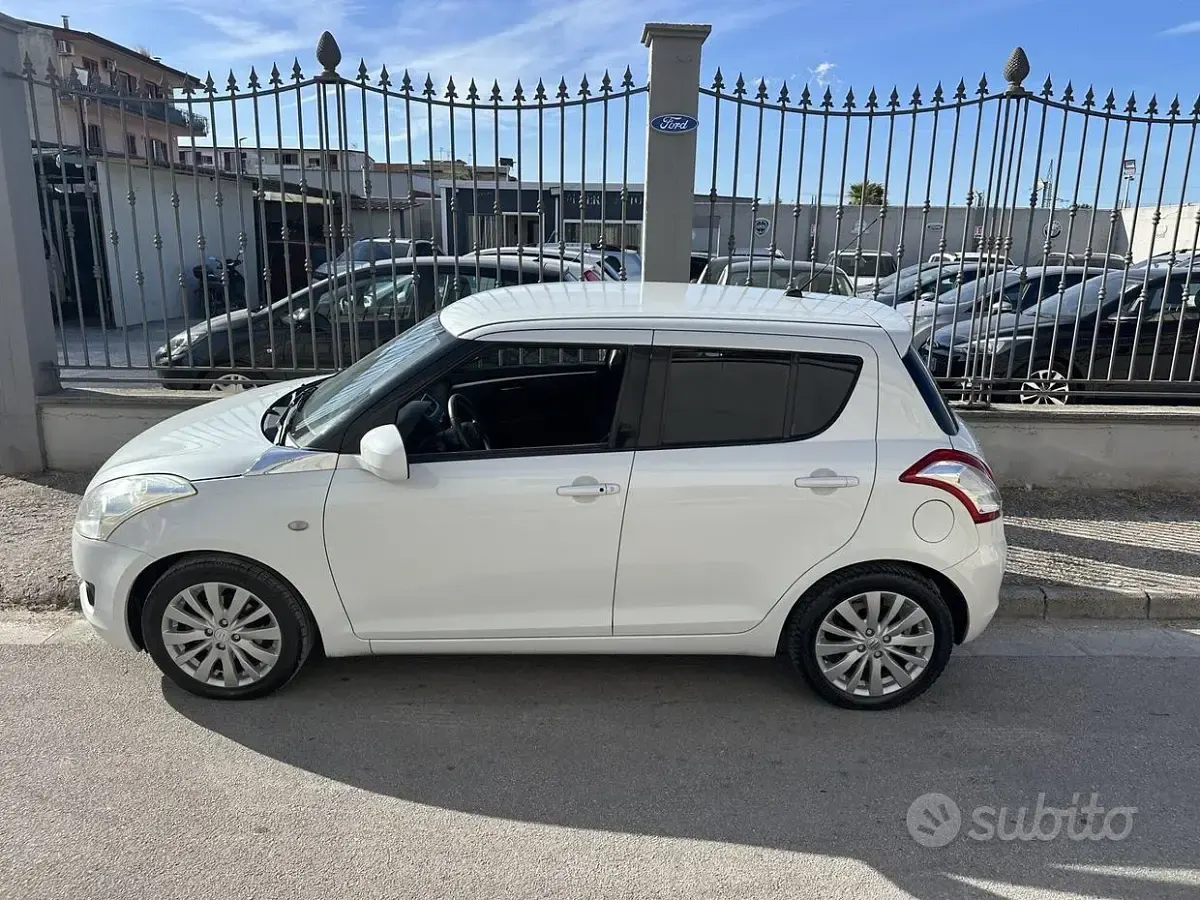 Usata Suzuki Swift 94 CV (69 kW) 2013 Bianco Utilitaria