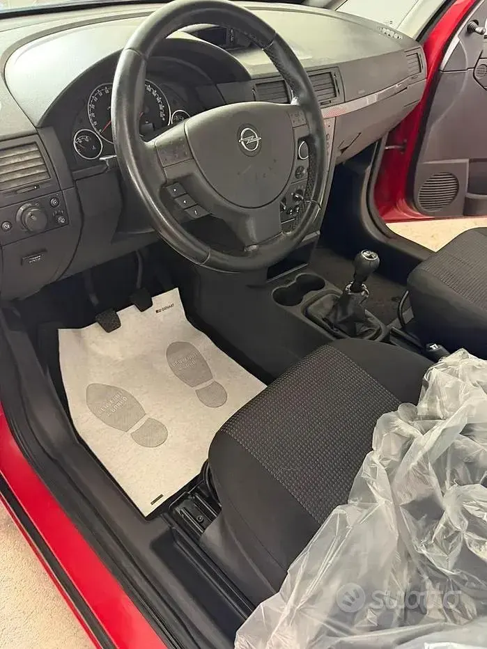 Usata Opel Meriva 90 CV (66 kW) 2010 Rosso Monovolume