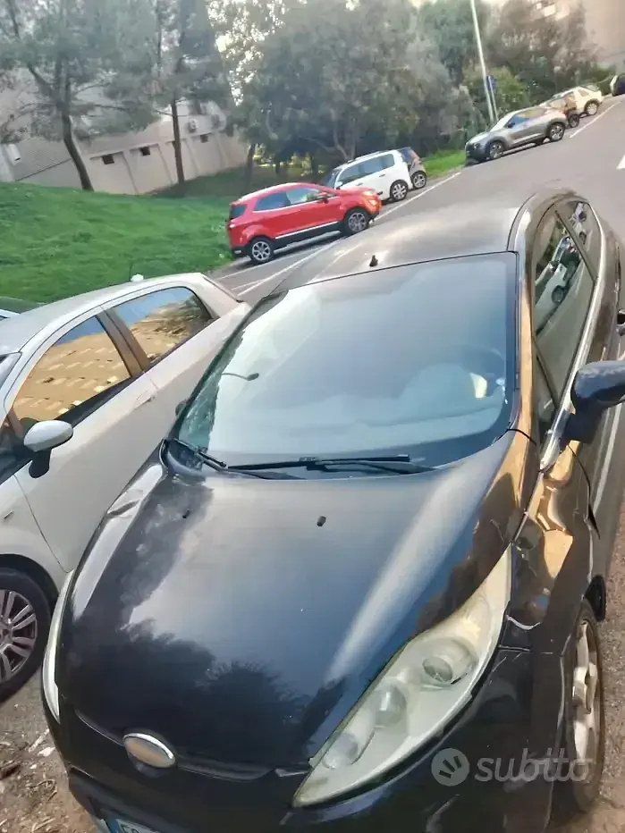 Usado Ford Fiesta 80 HP (58 kW) 2010 Preto Sedan