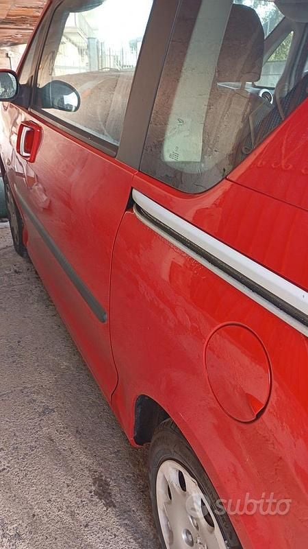 Usata Peugeot 1007 70 CV (51 kW) 2006 Rosso Monovolume