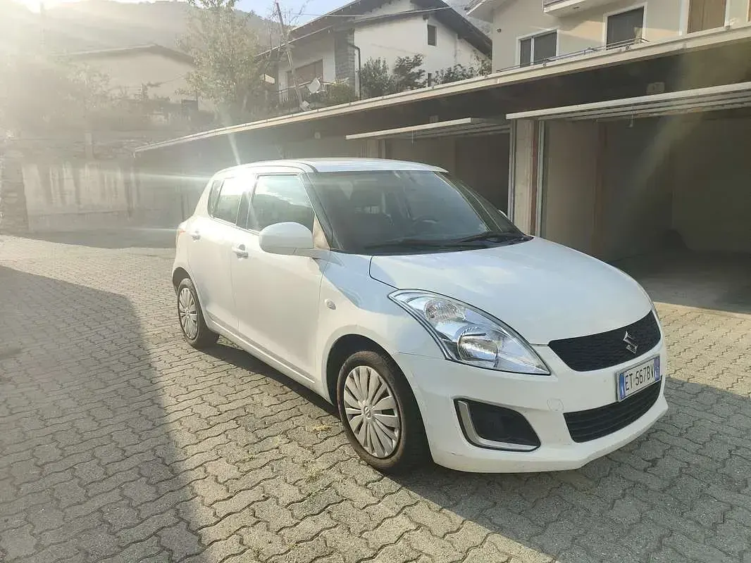 Usata Suzuki Swift 94 CV (69 kW) 2013 Bianco Utilitaria