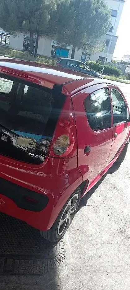 Usata Peugeot 107 68 CV (50 kW) 2009 Rosso Utilitaria