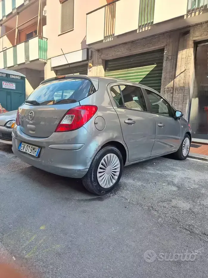 Usado Opel Corsa 75 HP (55 kW) 2012 Cinzento Citadino