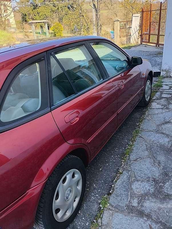 Usata Mazda 323 Exclusive 98 CV (72 kW) 2002 Rosso Berlina