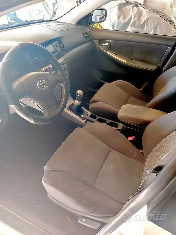 Usata Toyota Corolla 110 CV (80 kW) 2003 Bianco Berlina